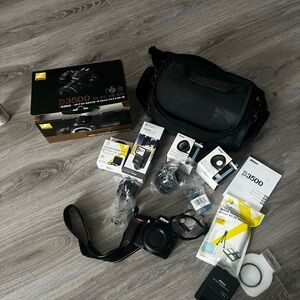 Nikon D3500 Black DSLR Camera Kit plus more accessories. Never used